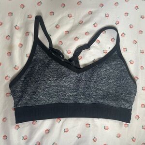 Pink Victoria’s Secret sports bra, size small